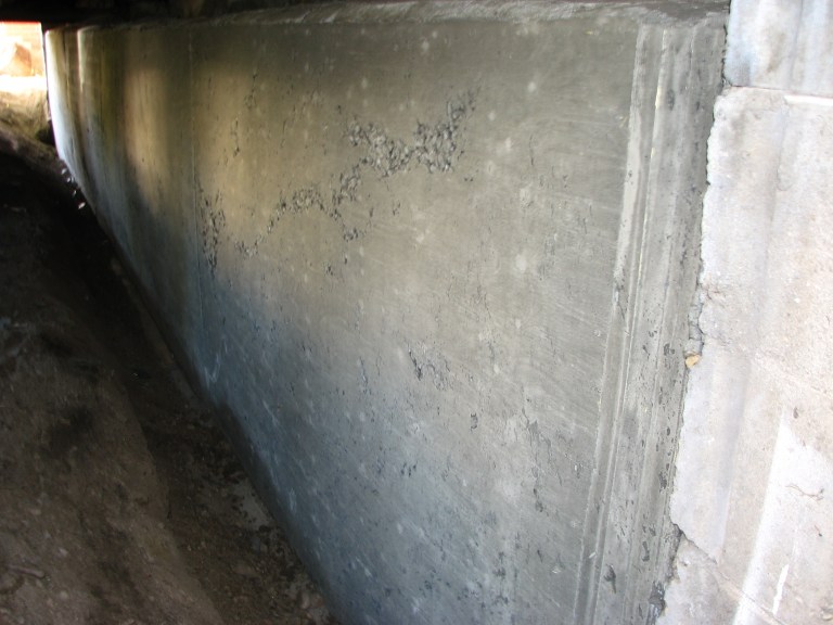 Proposed Solution: Medium - Containment – pour new foundation wall against the old to stop the structural failure.
