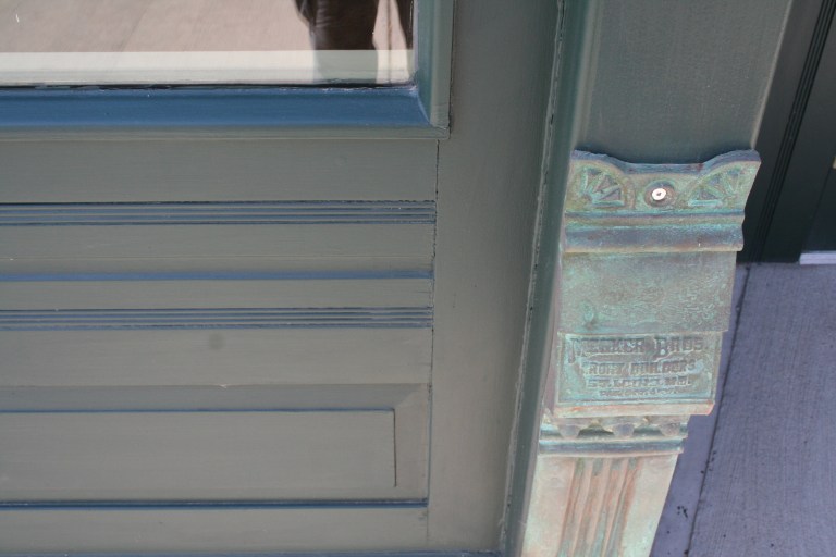 A close-up of the rehabilitated metal detailing (July 2014)