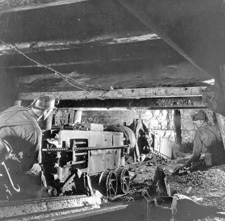 Miners using a universal coal cutter at Lethbridge Collieries, ca. 1950 Source: Provincial Archives of Alberta, A9908 