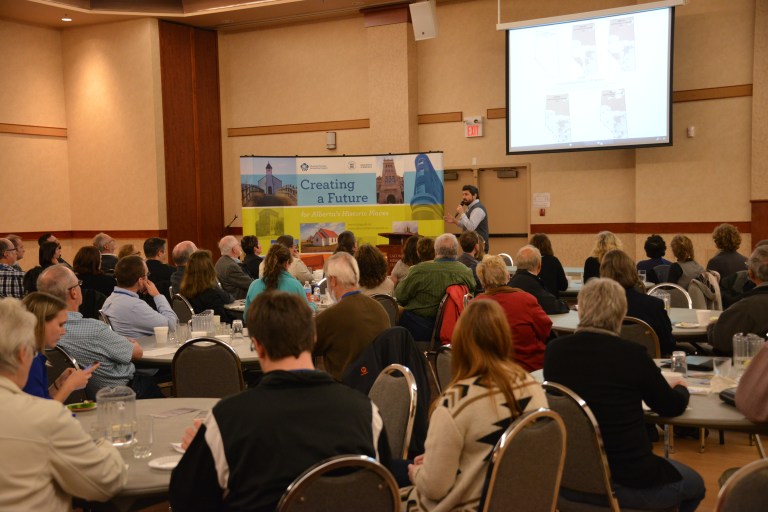 Forum attendees attentively taking in the closing keynote presentation by Larry Laliberté on "Historical GIS: Connecting Collections." 