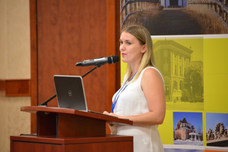 Kayla Jonas-Galvin speaking to the delegates at Municipal Heritage Forum. (October 16, 2014)