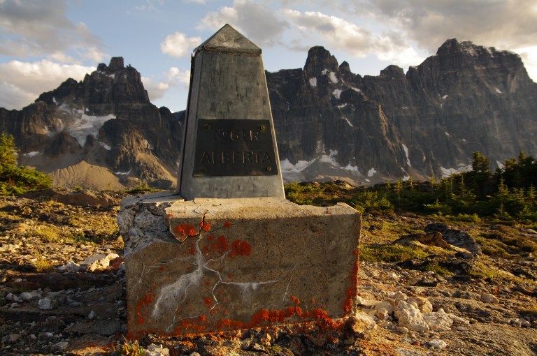Provincial boundary cairn marking border between Alberta and British Columbia.