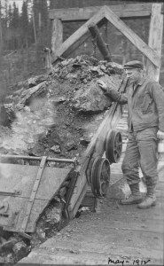 A worker dumping a load of coal through the tipple, May 1912 (Photo Credit: Provincial Archives of Alberta, Edmonton, PR1991.0312 A19992).