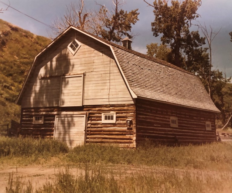 Doukhobor barn, constructed in 1939, and located approximately 5 kilometres east of Cowley. Photo taken in 1973. 