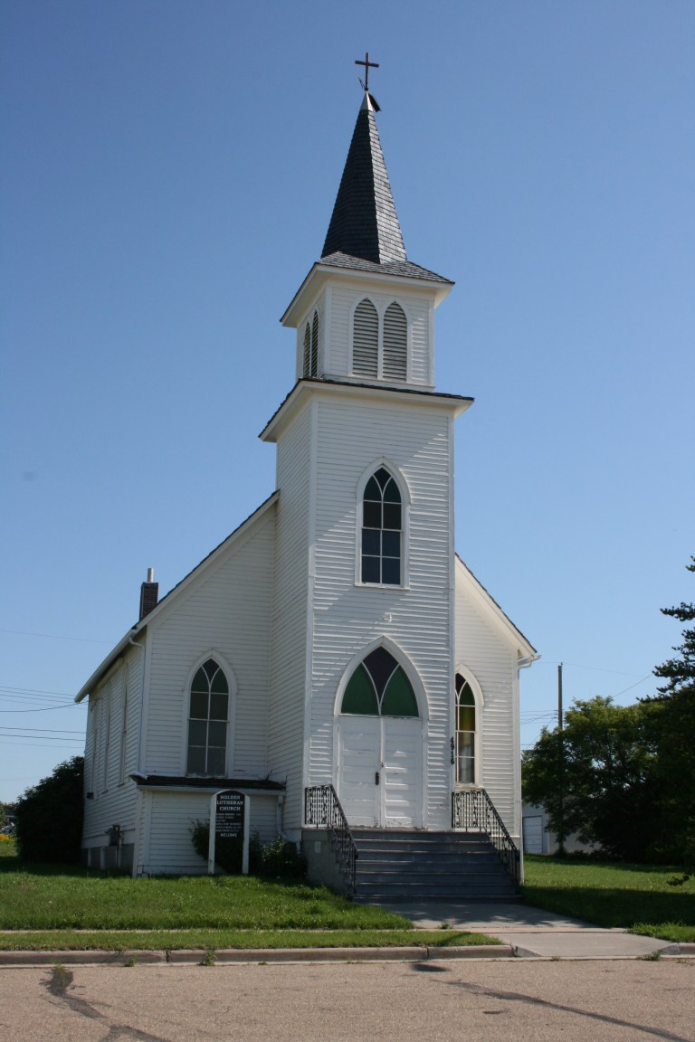 Holden Lutheran Church. The tall steeple of this church is visible throughout much of the community, where it is valued as a recognized and prominent landmark.